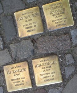 Berlin's stolpersteine, "stumbling stones", monuments across the city (and beyond) that indicate where victims and survivors of the Holocaust lived.